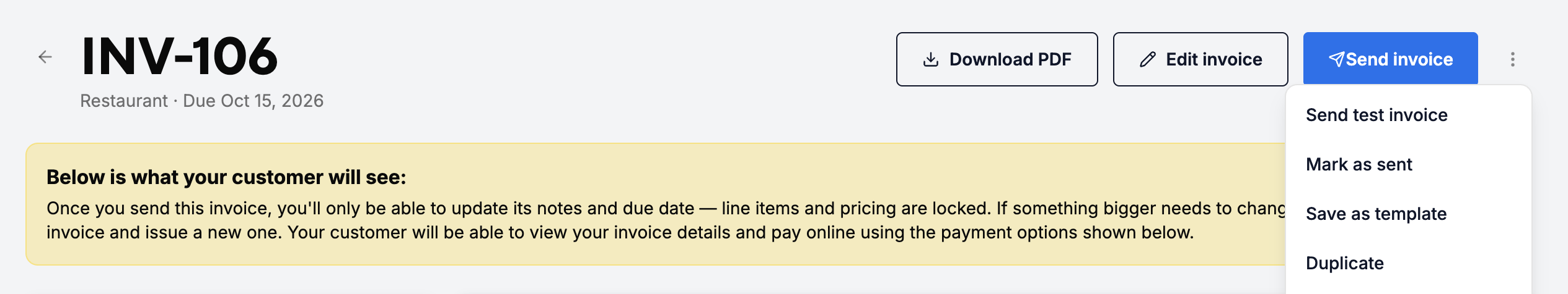 A draft invoice header with Download PDF, Edit invoice and Send invoice buttons and the More actions menu open